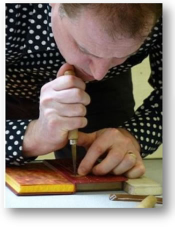 Dominic Riley is a bookbinder, artist and teacher. This is his first visit to Woking.